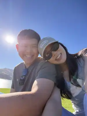 Gabriel and Estella by a sunny New Zealand lake