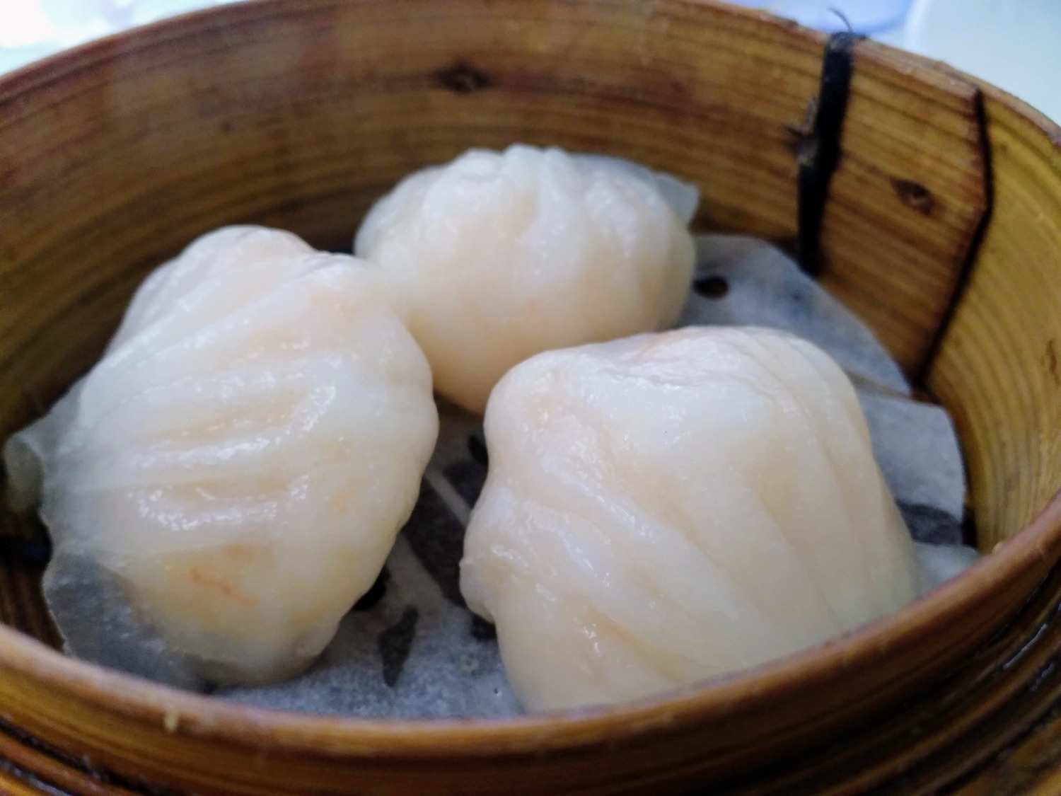 Dim sum dumplings in a steamer