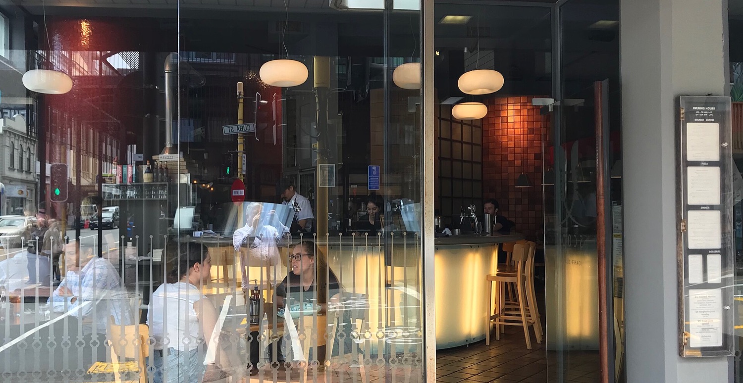 A central Wellington restaurant window at night